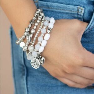 Paparazzi: No CHARM
Done - White Bracelet